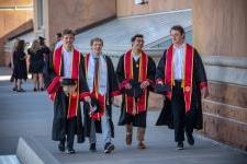 Commencement four males